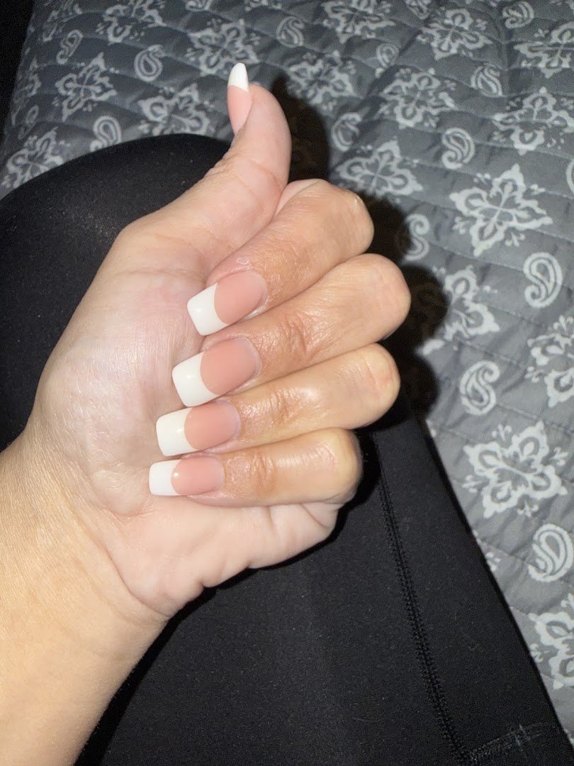 Manicured nails with detailed salon nail art